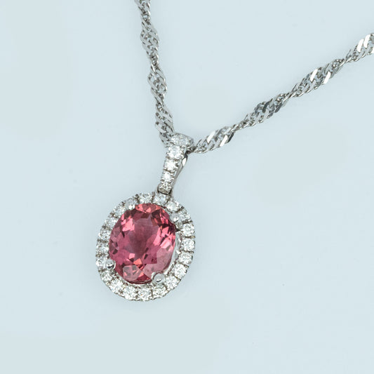 18 carat white gold pink tourmaline and halo of diamond pendant