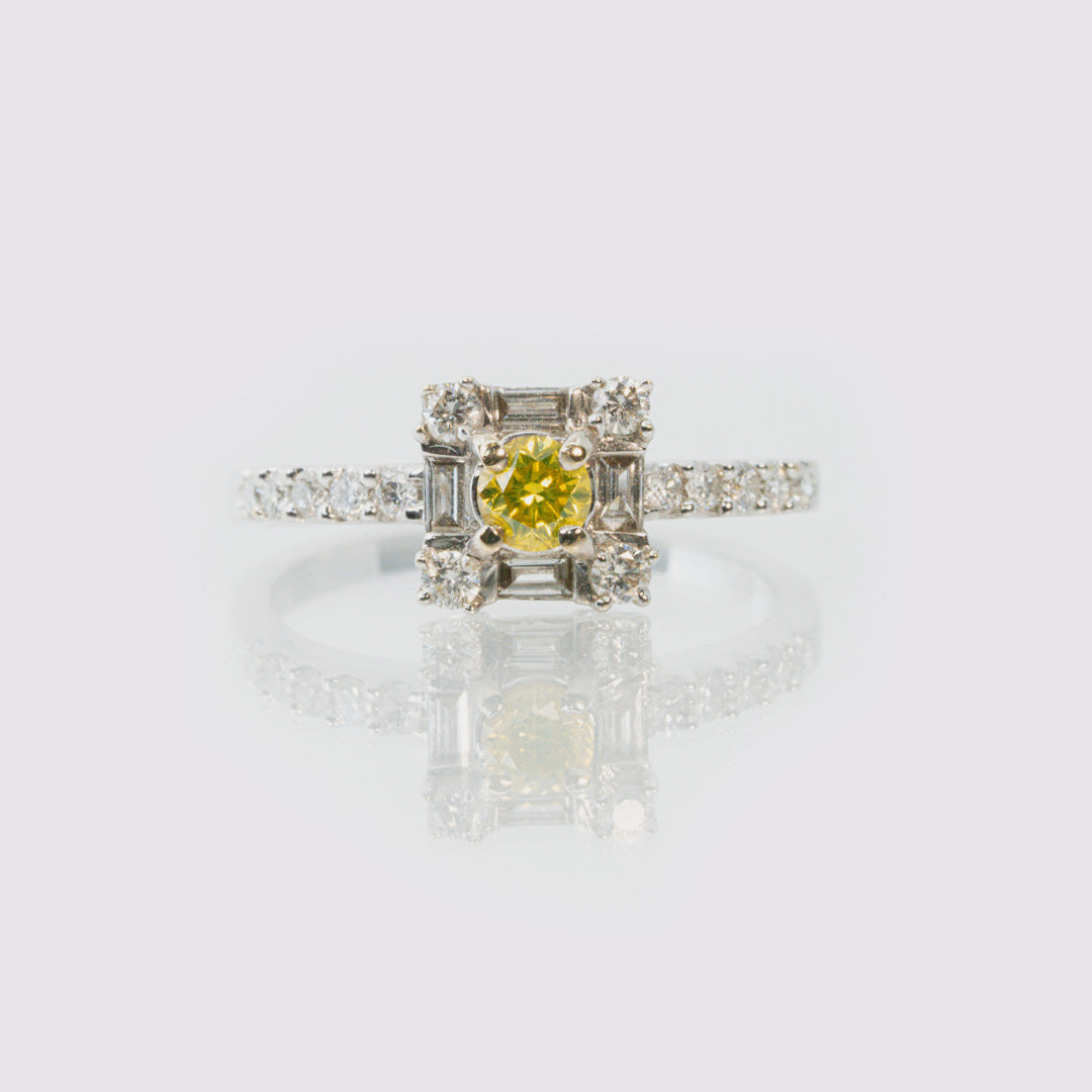 18 carat white gold diamond and yellow sapphire dress ring