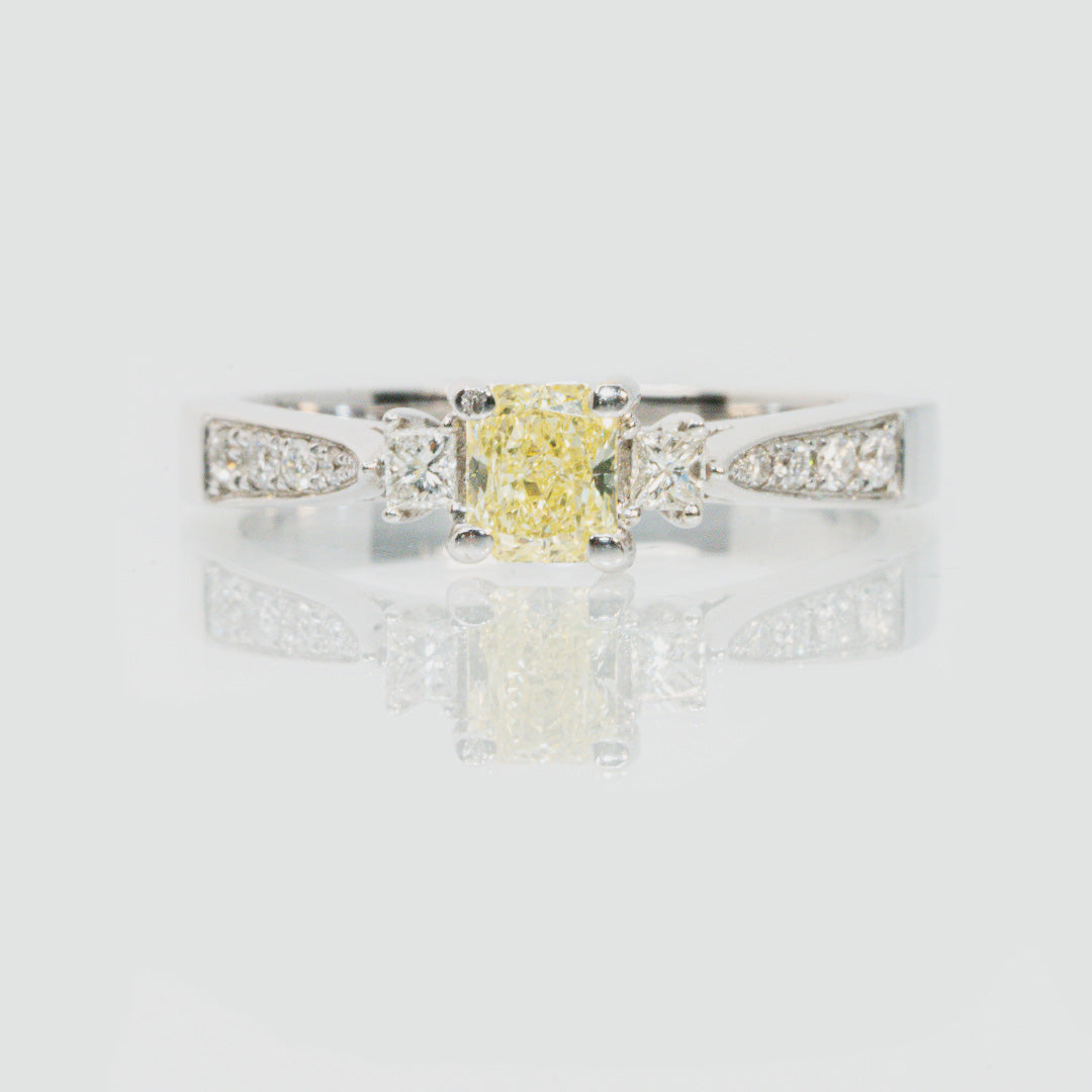 18 carat white gold intense yellow and white diamond engagement ring