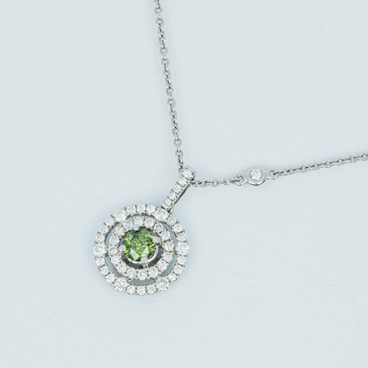 18 carat white gold green and white diamond halo pendant
