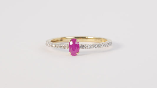 9 carat yellow gold diamond and ruby centre stone dress ring